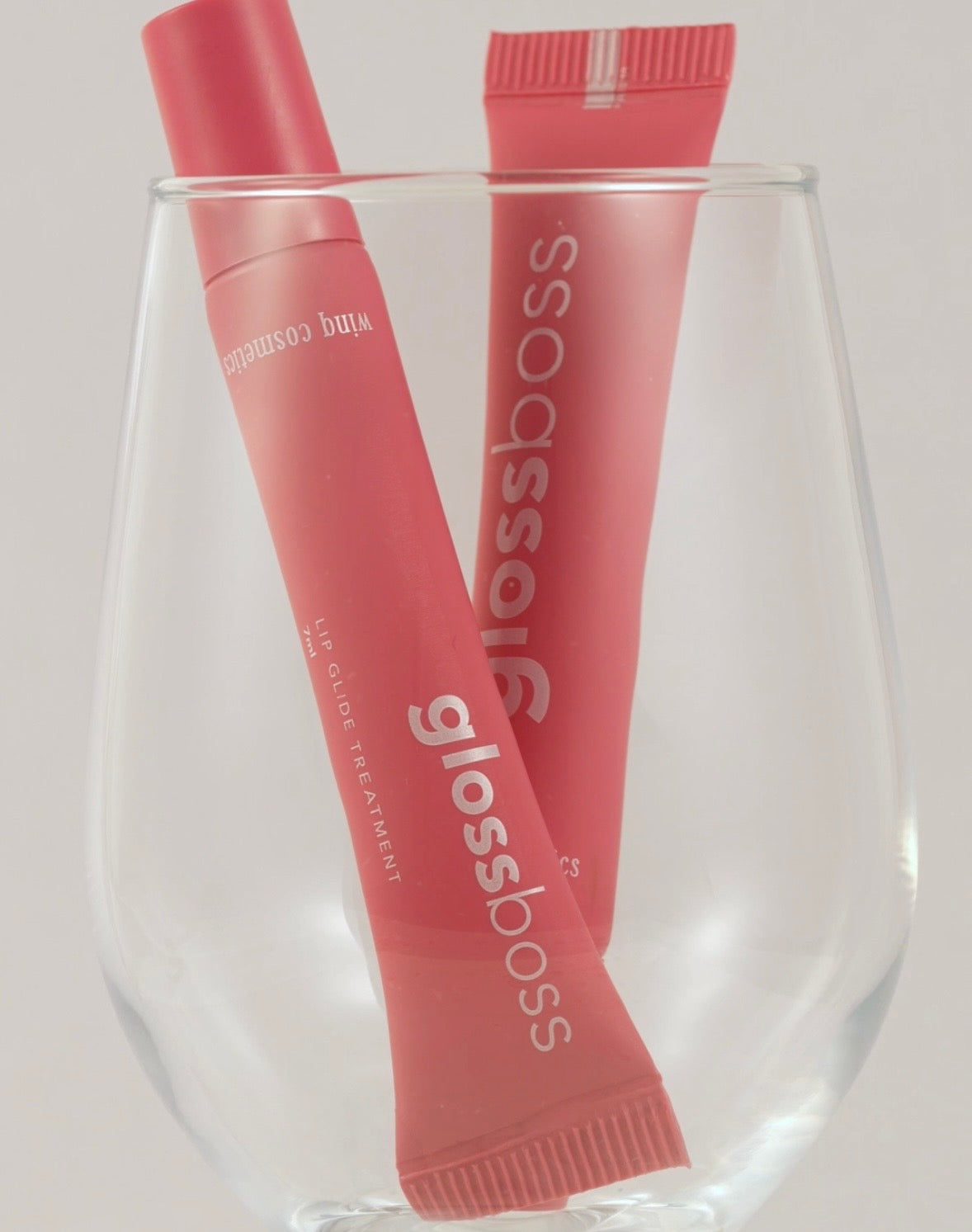 Combo of 2 Lip Treatment GLOSSBOSS(pink & clear) plus tote bag & charms